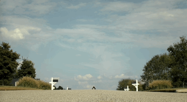 Adebayo running in peacemaker on earth x