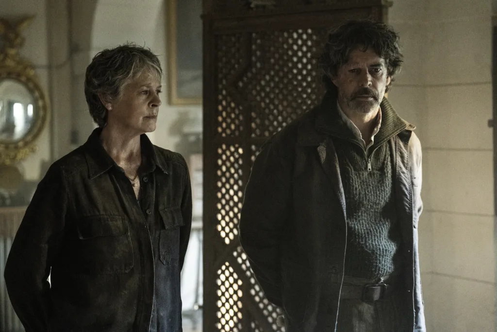 - ThMelissa McBride as Carol Peletier, Eduardo Noriega as Antonioe Walking Dead: Daryl Dixon _ Season 3, Episode 7 - Photo Credit: Carla Oset/AMC