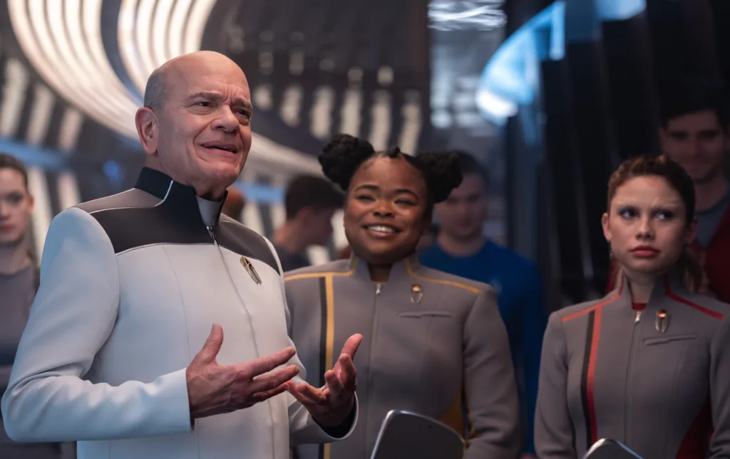 L-R: Robert Picardo as The Doctor, Kerrice Brooks as Sam and Bella Shepard as Genesis in season 1 , episode 1 of Star Trek: Starfleet Academy streaming on Paramount+. Photo Credit: Brooke Palmer/Paramount+