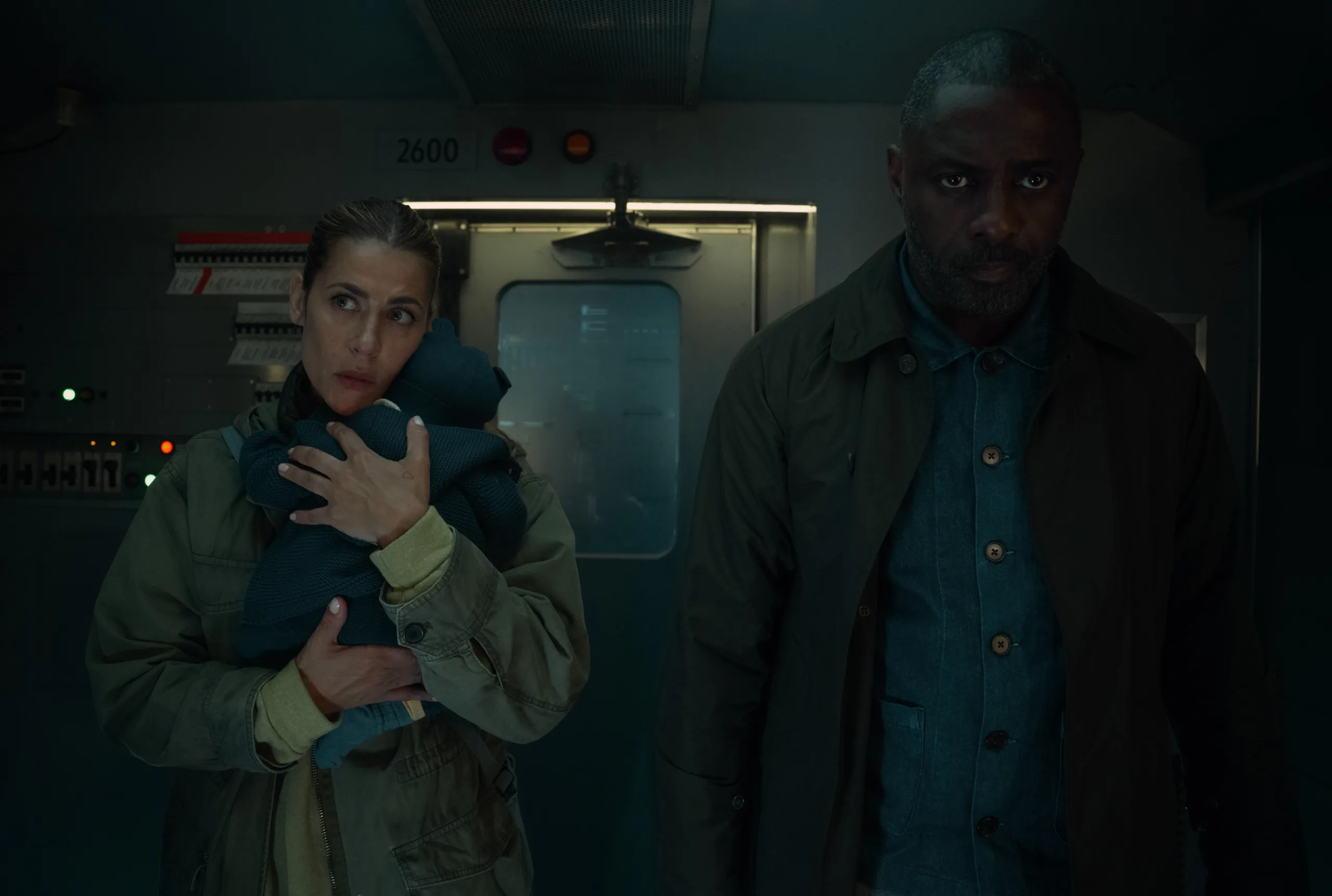 Karima McAdams and Idris Elba in "Hijack," now streaming on Apple TV.