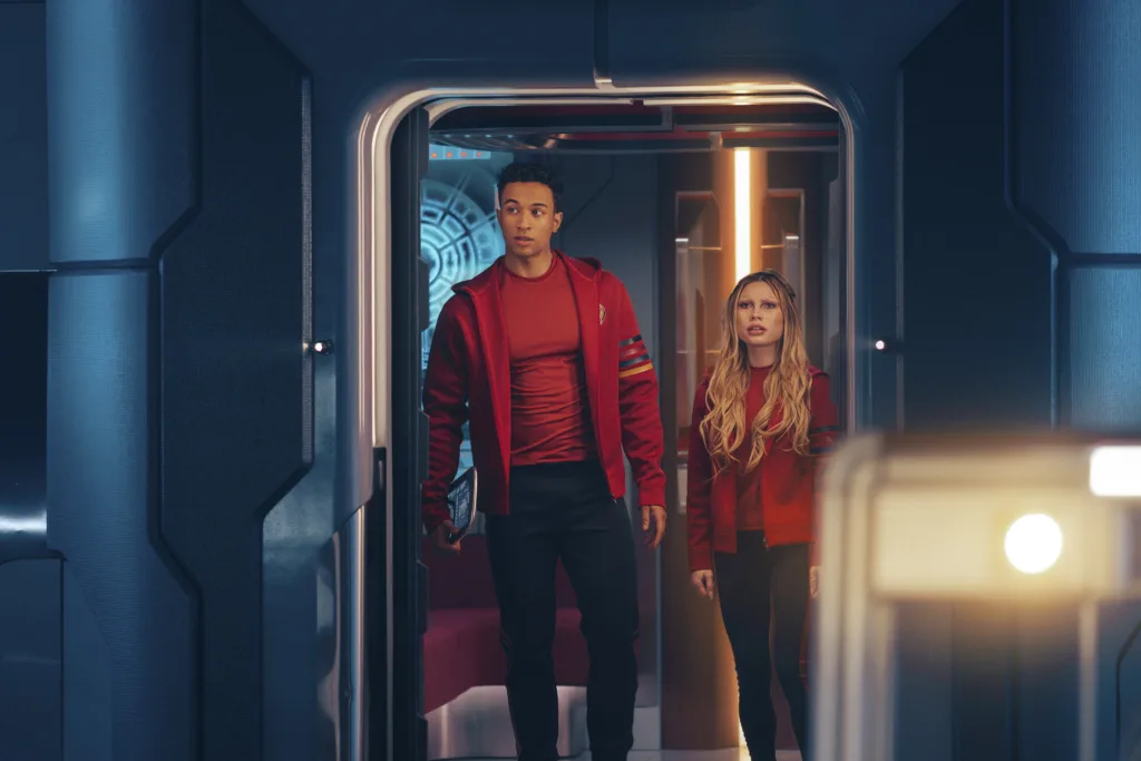 L-R: Sandro Rosta as Caleb and Bella Shepard as Genesis in season 1, episode 7, of Star Trek: Starfleet Academy streaming on Paramount+. Photo Credit: Brooke Palmer/Paramount+